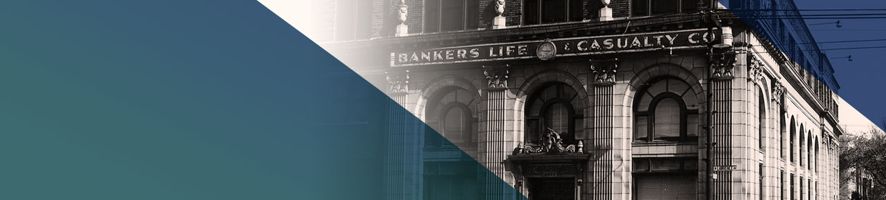 Bankers life & Casualty Company sign on side of historic building with columns